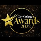 City Collage Awards 2022 logo. Black and gold with a gold shooting star and white and gold text arranged on a black circle with gold edge, against a black background with gold sparkles