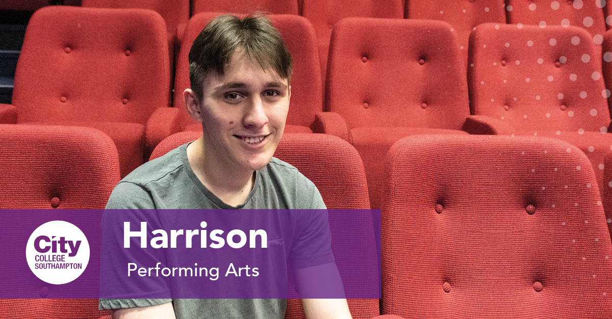 Headshot of Harrison sitting in the theatre auditorium