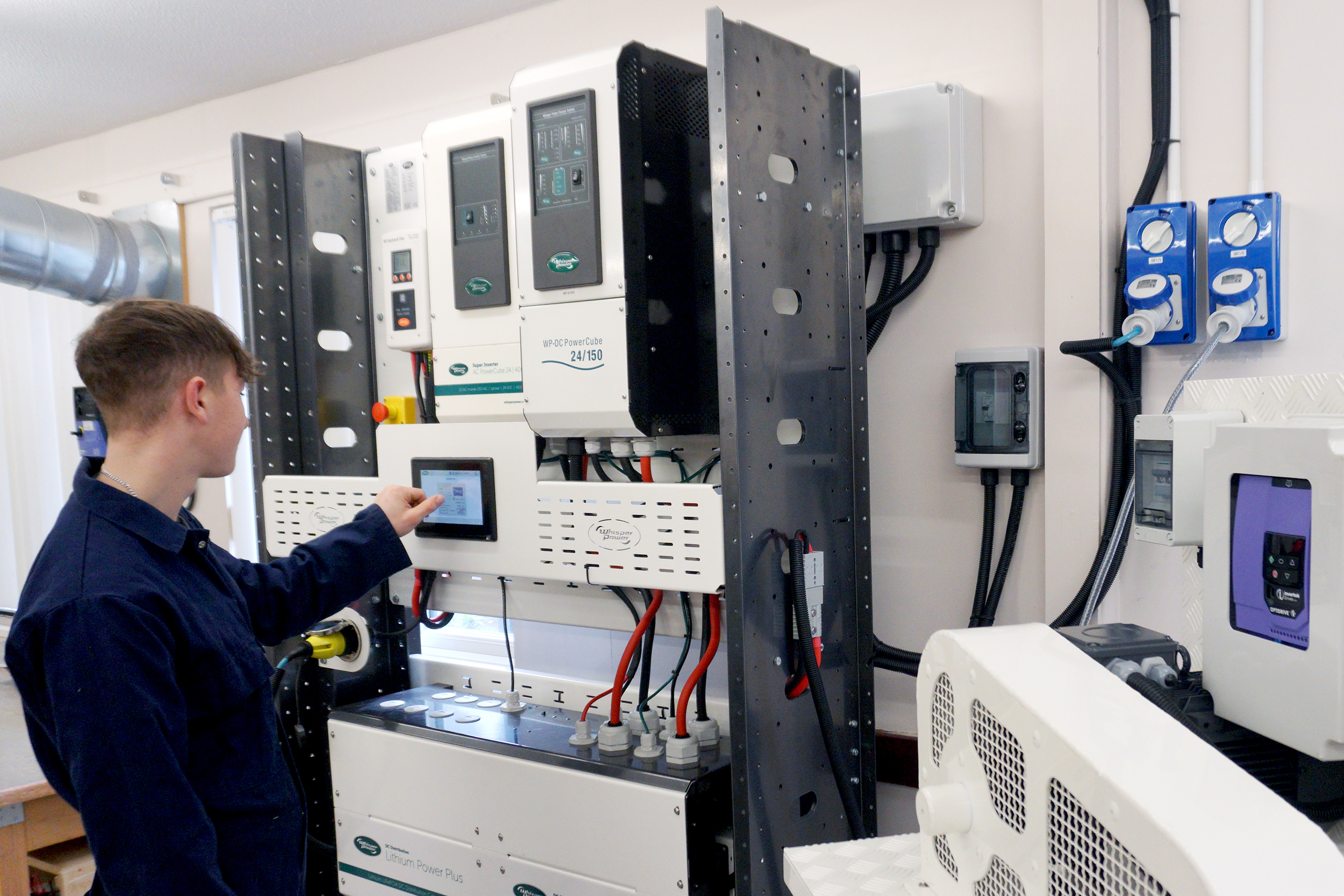 Marine Electrical Apprentice using advanced power technology of the future at City College’s Marine Skills Centre
