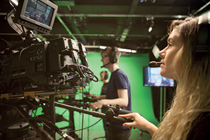 Series of photos showing students using large TV cameras in the studio with greenscreen