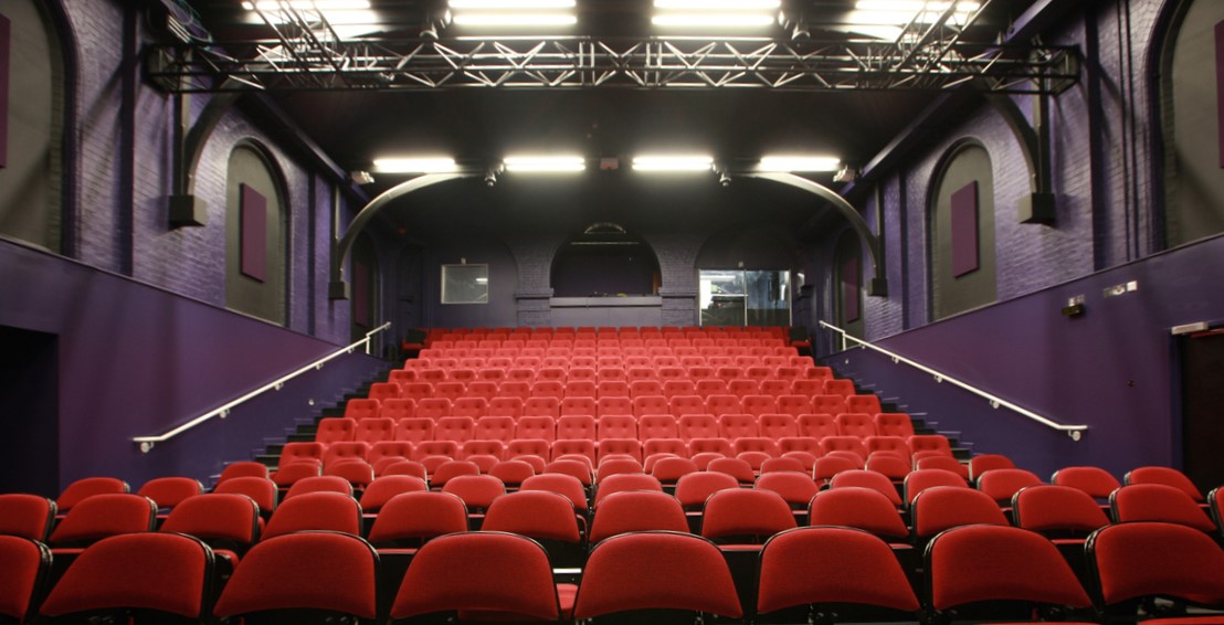 Hub Theatre auditorium tiered seats viewed from the stage